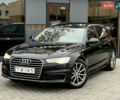 Чорний Ауді А6, об'ємом двигуна 2 л та пробігом 257 тис. км за 16900 $, фото 1 на Automoto.ua