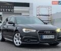 Черный Ауди А6, объемом двигателя 2 л и пробегом 332 тыс. км за 17800 $, фото 1 на Automoto.ua