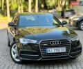 Черный Ауди А6, объемом двигателя 3 л и пробегом 299 тыс. км за 18350 $, фото 1 на Automoto.ua