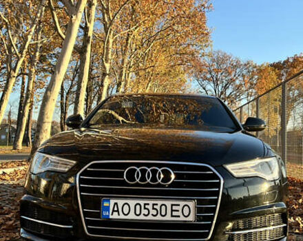 Черный Ауди А6, объемом двигателя 2 л и пробегом 243 тыс. км за 18000 $, фото 1 на Automoto.ua