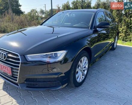 Черный Ауди А6, объемом двигателя 2 л и пробегом 239 тыс. км за 23100 $, фото 1 на Automoto.ua