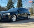 Черный Ауди А6, объемом двигателя 2 л и пробегом 245 тыс. км за 16700 $, фото 1 на Automoto.ua