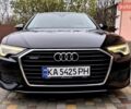 Черный Ауди А6, объемом двигателя 1.97 л и пробегом 244 тыс. км за 26500 $, фото 1 на Automoto.ua