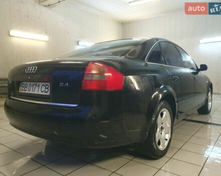 Чорний Ауді А6, об'ємом двигуна 2.39 л та пробігом 211 тис. км за 3900 $, фото 1 на Automoto.ua