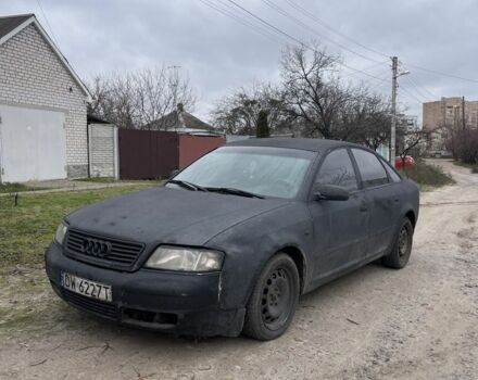 Черный Ауди А6, объемом двигателя 2.5 л и пробегом 300 тыс. км за 1450 $, фото 1 на Automoto.ua