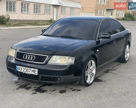 Черный Ауди А6, объемом двигателя 1.8 л и пробегом 300 тыс. км за 2950 $, фото 1 на Automoto.ua