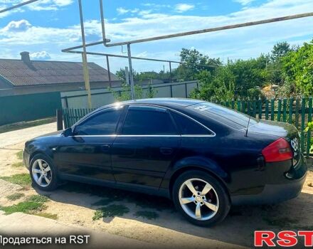 Черный Ауди А6, объемом двигателя 1.8 л и пробегом 350 тыс. км за 4500 $, фото 1 на Automoto.ua