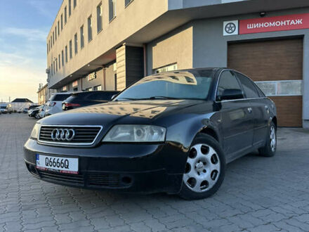 Черный Ауди А6, объемом двигателя 1.78 л и пробегом 327 тыс. км за 3800 $, фото 1 на Automoto.ua
