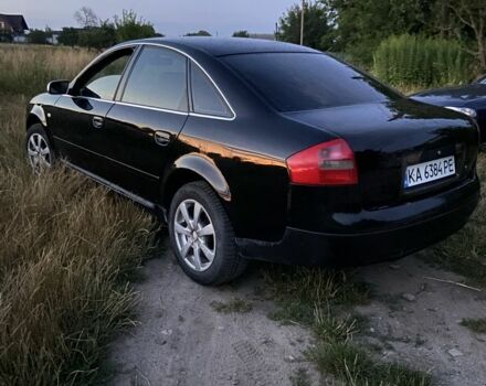 Черный Ауди А6, объемом двигателя 1.8 л и пробегом 300 тыс. км за 2800 $, фото 1 на Automoto.ua