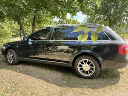 Черный Ауди А6, объемом двигателя 2.4 л и пробегом 312 тыс. км за 4100 $, фото 1 на Automoto.ua