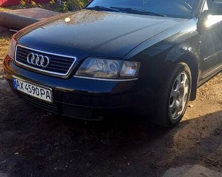 Черный Ауди А6, объемом двигателя 1.8 л и пробегом 300 тыс. км за 4500 $, фото 1 на Automoto.ua