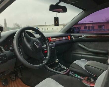 Черный Ауди А6, объемом двигателя 1.9 л и пробегом 256 тыс. км за 3800 $, фото 1 на Automoto.ua