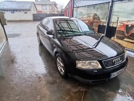 Черный Ауди А6, объемом двигателя 1.8 л и пробегом 300 тыс. км за 4800 $, фото 1 на Automoto.ua