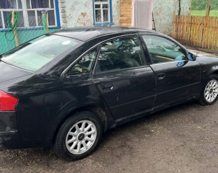 Черный Ауди А6, объемом двигателя 1.8 л и пробегом 397 тыс. км за 1100 $, фото 1 на Automoto.ua