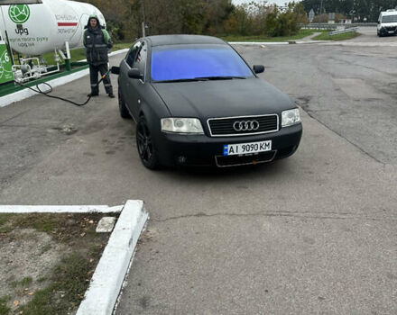 Черный Ауди А6, объемом двигателя 1.8 л и пробегом 320 тыс. км за 5200 $, фото 1 на Automoto.ua