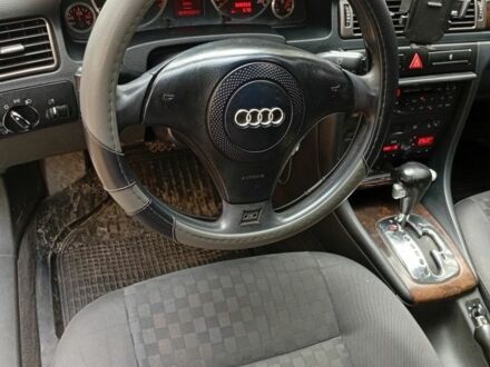 Черный Ауди А6, объемом двигателя 2 л и пробегом 37 тыс. км за 2100 $, фото 1 на Automoto.ua
