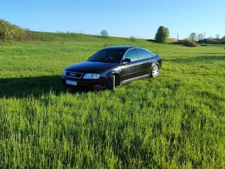 Черный Ауди А6, объемом двигателя 1.8 л и пробегом 350 тыс. км за 5200 $, фото 1 на Automoto.ua