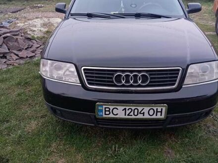 Черный Ауди А6, объемом двигателя 1.8 л и пробегом 250 тыс. км за 3800 $, фото 1 на Automoto.ua