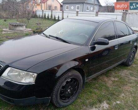 Черный Ауди А6, объемом двигателя 1.8 л и пробегом 250 тыс. км за 3800 $, фото 1 на Automoto.ua