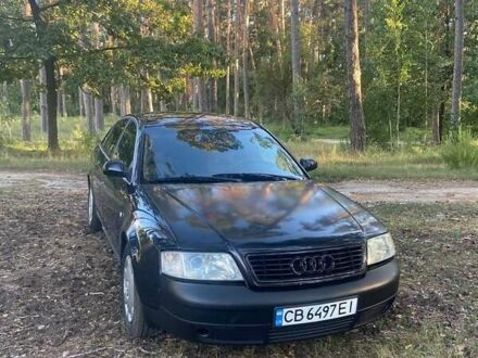Черный Ауди А6, объемом двигателя 2.4 л и пробегом 230 тыс. км за 3700 $, фото 1 на Automoto.ua