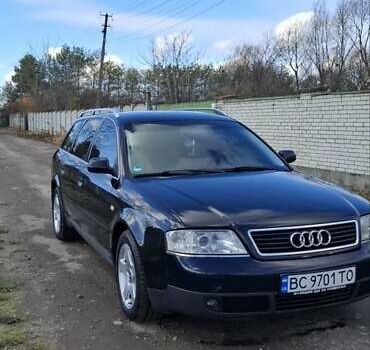 Черный Ауди А6, объемом двигателя 2.5 л и пробегом 383 тыс. км за 4650 $, фото 1 на Automoto.ua