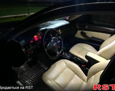 Черный Ауди А6, объемом двигателя 2.4 л и пробегом 280 тыс. км за 3800 $, фото 1 на Automoto.ua