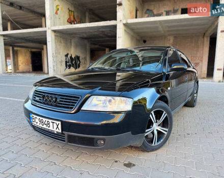 Черный Ауди А6, объемом двигателя 2.4 л и пробегом 290 тыс. км за 5500 $, фото 1 на Automoto.ua