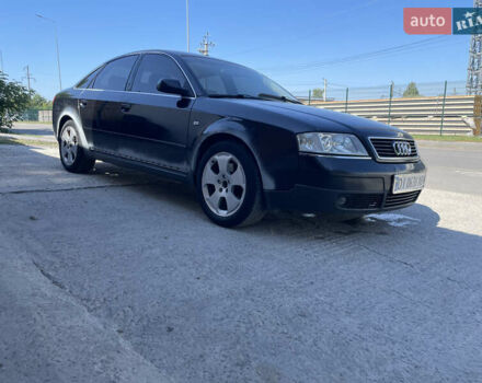 Черный Ауди А6, объемом двигателя 2.39 л и пробегом 280 тыс. км за 3800 $, фото 1 на Automoto.ua