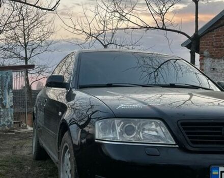 Черный Ауди А6, объемом двигателя 2.5 л и пробегом 380 тыс. км за 2800 $, фото 1 на Automoto.ua
