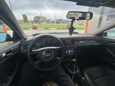 Черный Ауди А6, объемом двигателя 2.5 л и пробегом 380 тыс. км за 3000 $, фото 1 на Automoto.ua