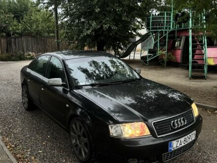 Черный Ауди А6, объемом двигателя 2 л и пробегом 380 тыс. км за 1290 $, фото 1 на Automoto.ua