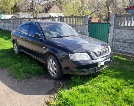 Черный Ауди А6, объемом двигателя 2 л и пробегом 250 тыс. км за 2600 $, фото 1 на Automoto.ua