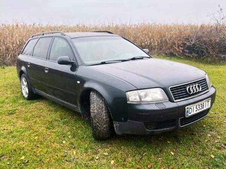 Черный Ауди А6, объемом двигателя 2.5 л и пробегом 250 тыс. км за 4000 $, фото 1 на Automoto.ua