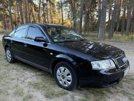 Черный Ауди А6, объемом двигателя 1.8 л и пробегом 245 тыс. км за 2450 $, фото 1 на Automoto.ua