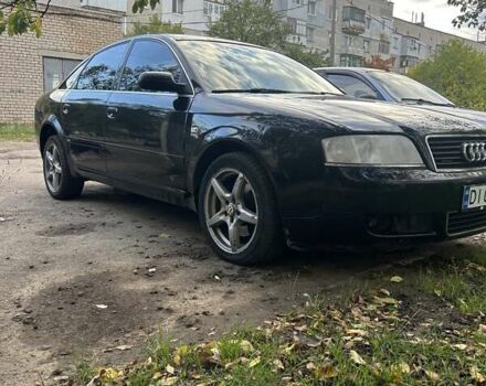 Черный Ауди А6, объемом двигателя 2.5 л и пробегом 400 тыс. км за 3900 $, фото 1 на Automoto.ua