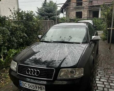 Черный Ауди А6, объемом двигателя 2.5 л и пробегом 277 тыс. км за 4000 $, фото 1 на Automoto.ua