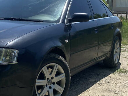Черный Ауди А6, объемом двигателя 2.5 л и пробегом 395 тыс. км за 4000 $, фото 1 на Automoto.ua