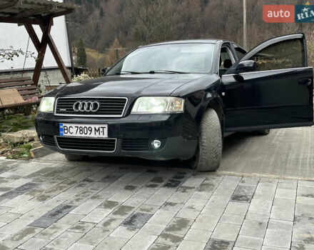 Черный Ауди А6, объемом двигателя 2.39 л и пробегом 300 тыс. км за 4399 $, фото 1 на Automoto.ua
