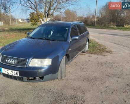 Черный Ауди А6, объемом двигателя 2.5 л и пробегом 248 тыс. км за 1750 $, фото 1 на Automoto.ua