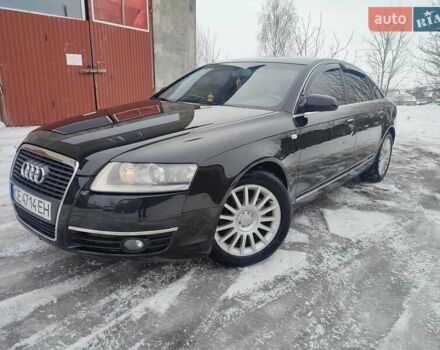 Черный Ауди А6, объемом двигателя 2 л и пробегом 323 тыс. км за 6999 $, фото 1 на Automoto.ua
