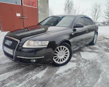 Черный Ауди А6, объемом двигателя 2 л и пробегом 323 тыс. км за 6999 $, фото 1 на Automoto.ua