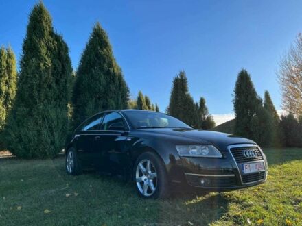 Черный Ауди А6, объемом двигателя 2 л и пробегом 400 тыс. км за 3900 $, фото 1 на Automoto.ua