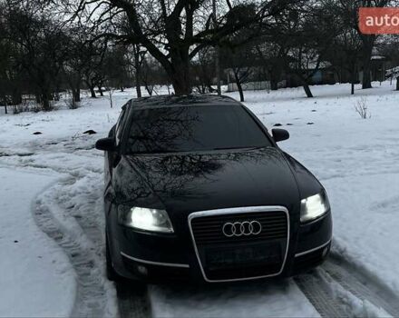Черный Ауди А6, объемом двигателя 2.4 л и пробегом 295 тыс. км за 6500 $, фото 1 на Automoto.ua