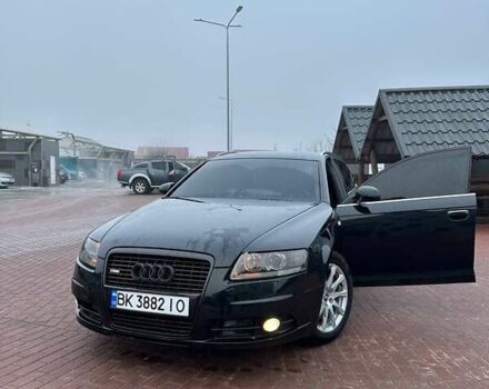 Черный Ауди А6, объемом двигателя 2.7 л и пробегом 322 тыс. км за 10500 $, фото 1 на Automoto.ua