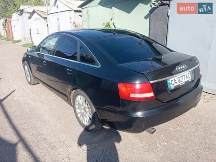 Черный Ауди А6, объемом двигателя 2.4 л и пробегом 324 тыс. км за 5500 $, фото 1 на Automoto.ua