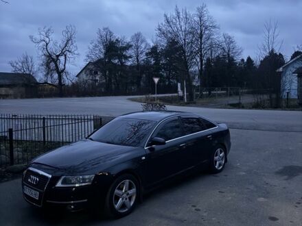 Черный Ауди А6, объемом двигателя 2.4 л и пробегом 270 тыс. км за 7250 $, фото 1 на Automoto.ua