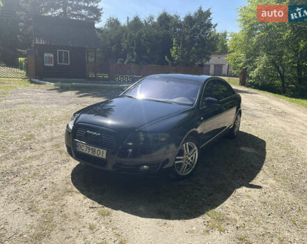 Черный Ауди А6, объемом двигателя 2 л и пробегом 408 тыс. км за 7400 $, фото 1 на Automoto.ua