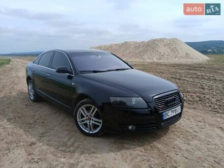 Черный Ауди А6, объемом двигателя 2 л и пробегом 417 тыс. км за 6950 $, фото 1 на Automoto.ua
