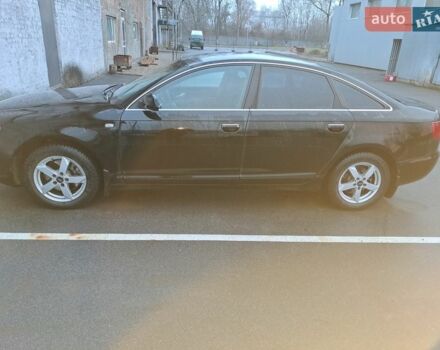 Черный Ауди А6, объемом двигателя 2.4 л и пробегом 315 тыс. км за 4500 $, фото 1 на Automoto.ua