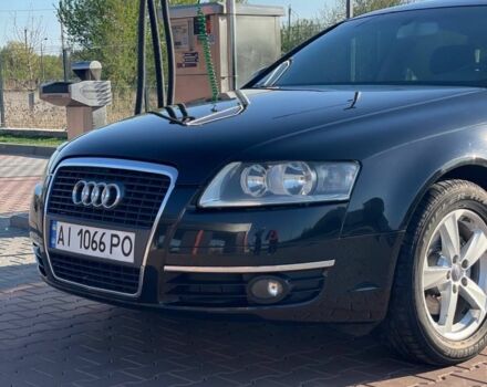 Черный Ауди А6, объемом двигателя 2 л и пробегом 330 тыс. км за 8100 $, фото 1 на Automoto.ua
